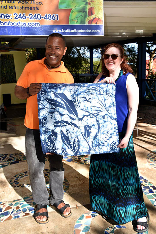 Christina Fairley Erickson and Henderson Reece with the completed and dried practice batik piece